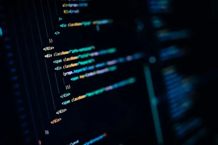 A close up of a computer screen with many lines of code on it